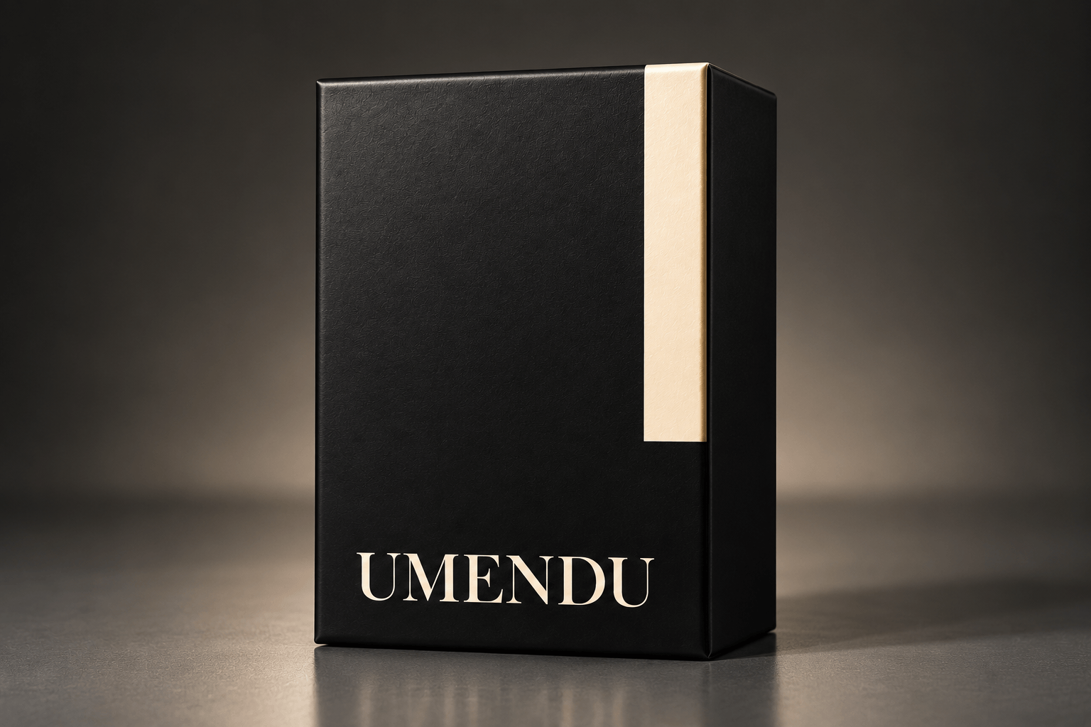 Closed black Umendu perfume presentation box with a cream accent and Umendu wordmark